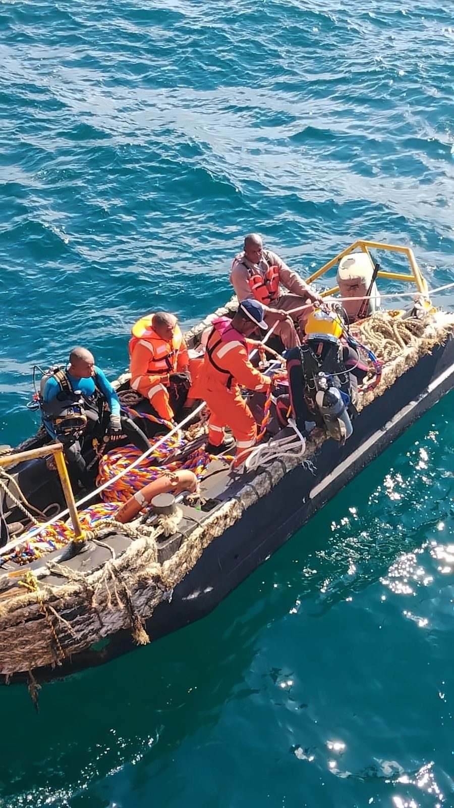 Dive Marine dive boat with divers and crew preparing for operations at sea